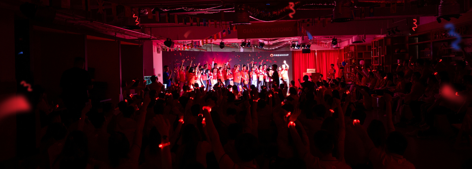Large audience silhouette at concert event